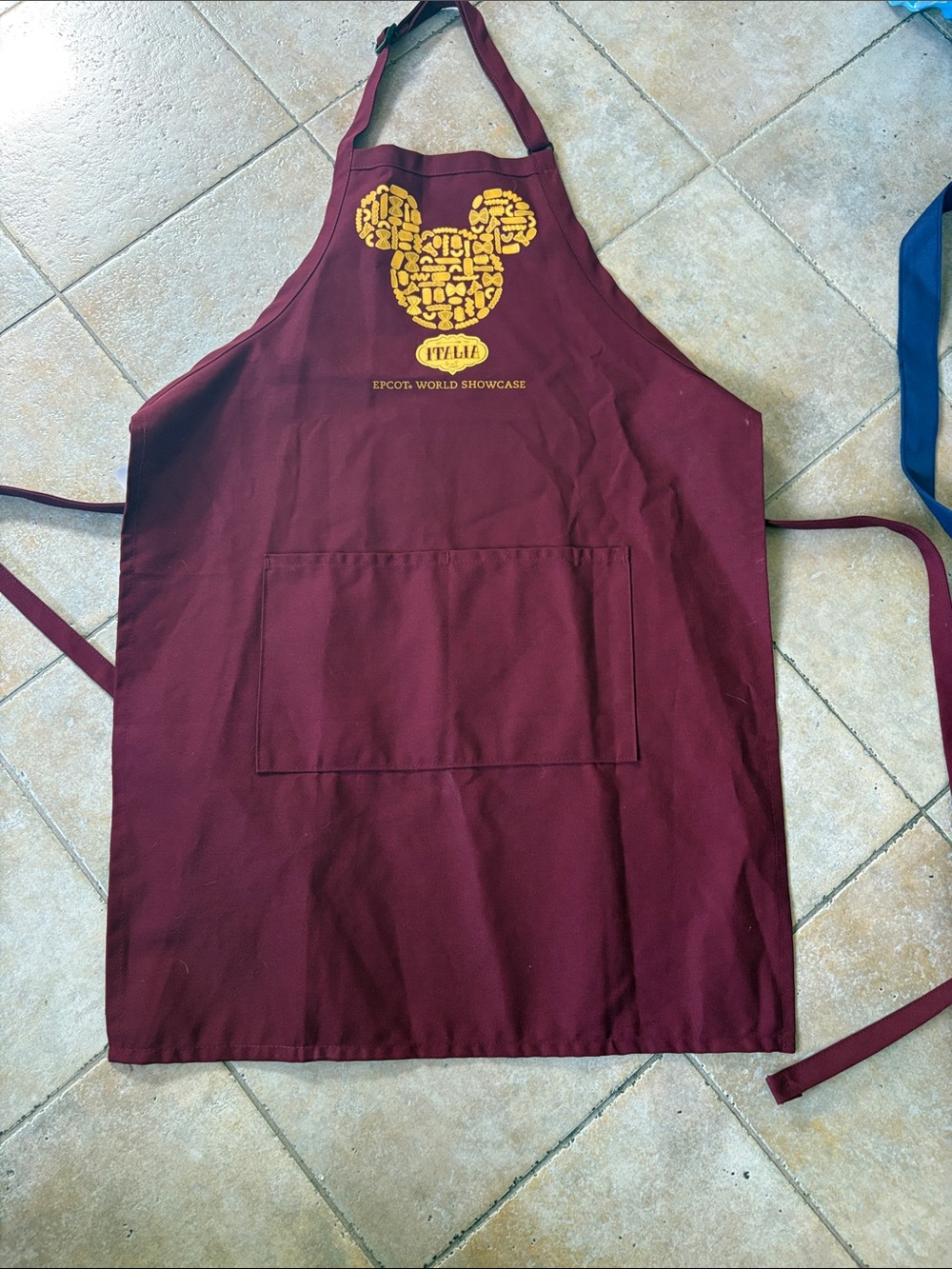 EPCOT World Showcase Maroon Mickey Apronlike new